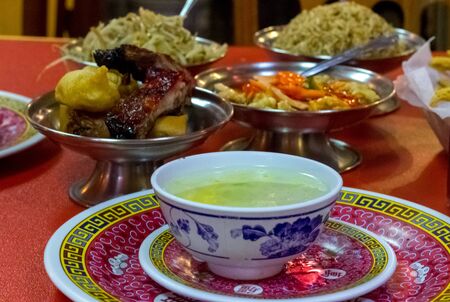 Variety of Chinese food. Lettuce soup, spring rolls, weathered shrimp. Cantonese chickenの写真素材