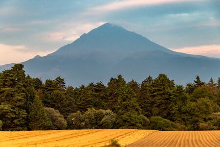 Scene from the Iztaczihuatl and Popocatepetl volcano. On a sunset.の写真素材