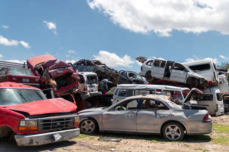 Old damaged cars on the junkyard waiting for recycling in Mexico City. Mexicoのeditorial素材