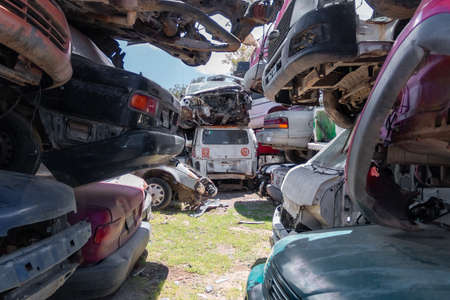Old damaged cars on the junkyard waiting for recycling in Mexico City. Mexicoのeditorial素材