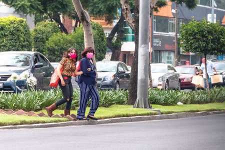 MEXICO CITY, MEXICO 08 08 2020 People in mexico city wearing respiratory masks due to a coronavirus pandemic. Covid-19のeditorial素材