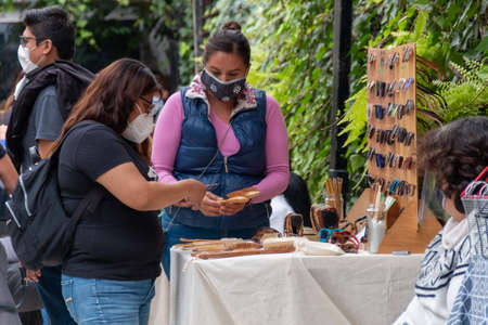 MEXICO CITY, MEXICO 08 08 2020 Woman buying organic products in local market. Fair tradeのeditorial素材