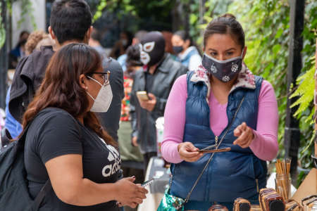 MEXICO CITY, MEXICO 08 08 2020 Woman buying organic products in local market. Fair tradeのeditorial素材