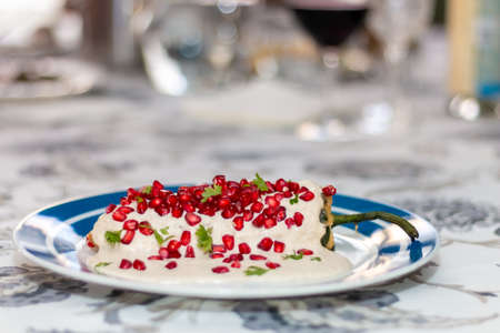 Chile en nogada, traditional festive dish on Mexican Independence Day. Green chili peppers with walnut sauce. National holidaysの写真素材