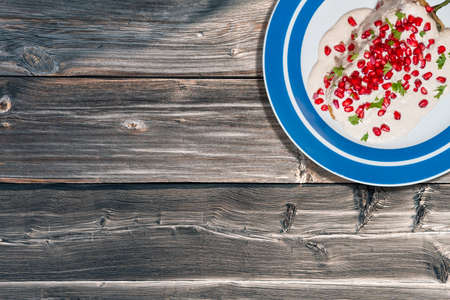 Top view of chiles en nogada, traditional festive dish on Mexican Independence Day. Green chili peppers with walnut sauce, common food for Mexico, in celebrations and national holidays. Copy Spaceの写真素材