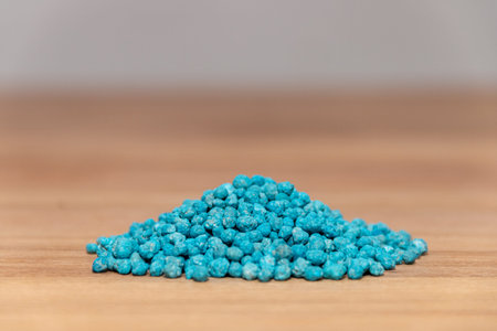 Fertilizer for plants. Blue balls of triple fertilizer 17. Agriculture