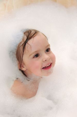 The child takes a bath.の写真素材