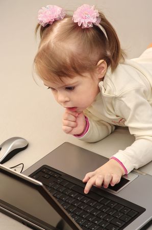 Child is studying computerの写真素材