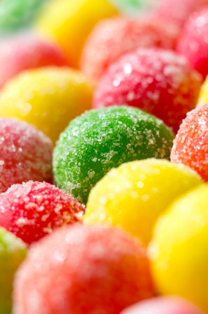 The background of multicolored dragee close-upの写真素材