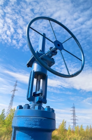 Oil valve with power masts in the backgroundの写真素材