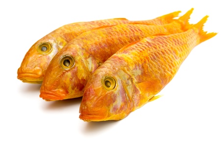 Smoked mullet on a white backgroundの写真素材