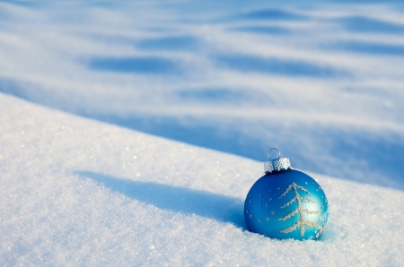 Christmas ball on the snow driftsの写真素材