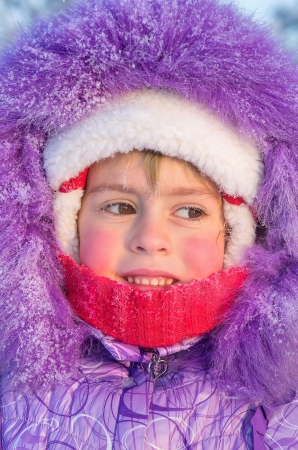 Portrait of little girl close-up on a cold day の写真素材