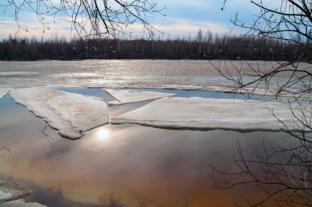 Spring Landscape  The setting sun is reflected in the water の写真素材