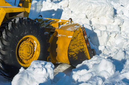 The dredge clears away snow driftsの写真素材