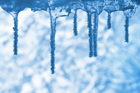 Winter landscape with icicles covered with hoarfrostの写真素材