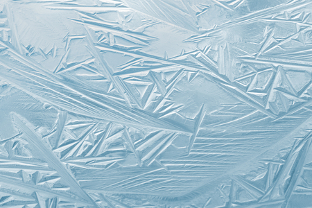 Abstract background of the first ice on the water surfaceの写真素材