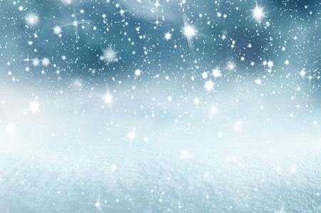 Winter christmas background with shiny snow and blizzardの写真素材