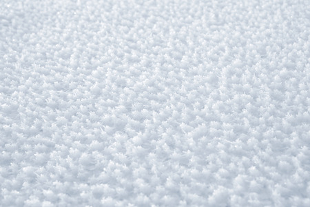 Background from crystals of frost on the surface of the water. Winter backgroundの写真素材
