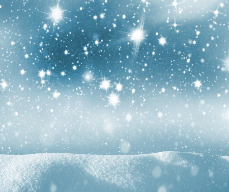 Winter christmas background with shiny snow and blizzard. Winter background with  starry sky.の写真素材