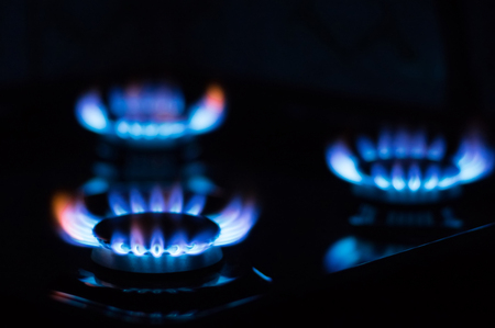 Flames from burning gas on the stove. Blue gas flameの写真素材