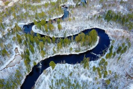 Winter landscape. Aerial view. Landscape with  winding freezing riverの写真素材