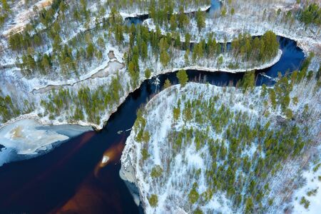 Winter landscape. Aerial view. Landscape with  winding freezing riverの写真素材