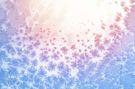 Frozen glass. Abstract winter ice pattern on frozen window.の写真素材