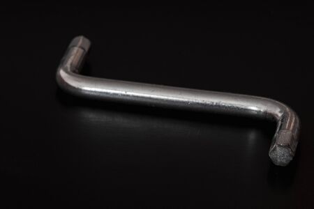 hexagon socket screw allen key in a black backgroundの写真素材