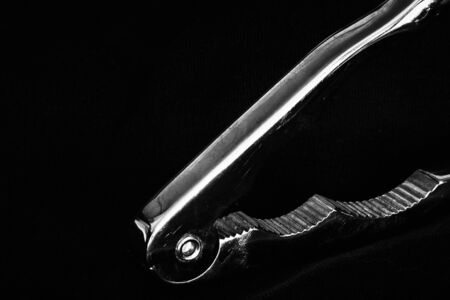 different angles and details of a classic nutcracker isolated in dark backgroundの写真素材