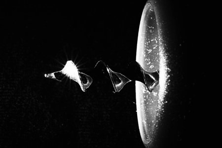 details of a corkscrew on a black background macro photographyの写真素材