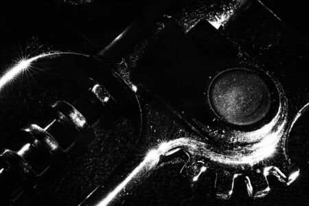details of a corkscrew on a black background macro photographyの写真素材