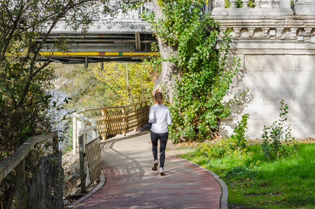 random people making physical activity in the parkのeditorial素材