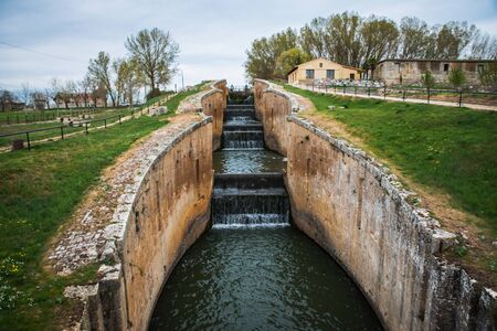 lock gates of the canal de castilla, castile channel, palencia, spainの写真素材