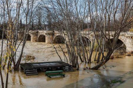 medieval stone bridge, puente mayor, crossing rio carrion, palencia, spainの写真素材