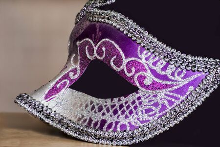 purple, magenta and silver carnival mask isolatedの写真素材