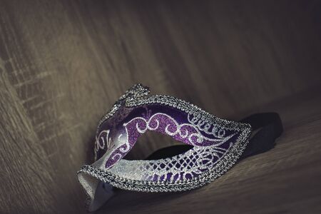 purple, magenta and silver carnival mask isolatedの写真素材