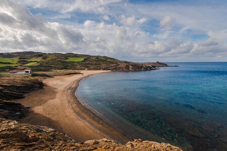 mica beach, abandoned paradise beaches during spring and summer in Menorca, a Spanish Mediterranean island, after the covid 19 coronavirus crisisの写真素材