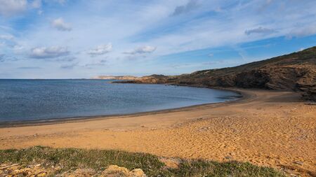 mica beach, abandoned paradise beaches during spring and summer in Menorca, a Spanish Mediterranean island, after the covid 19 coronavirus crisisの写真素材