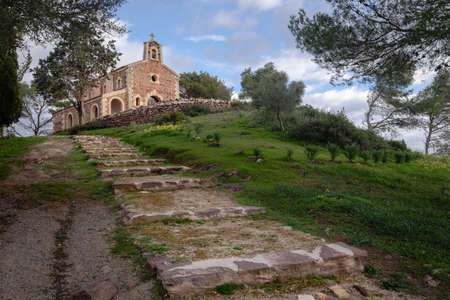 mediterranean little chapel over a hill in the countrysideの写真素材