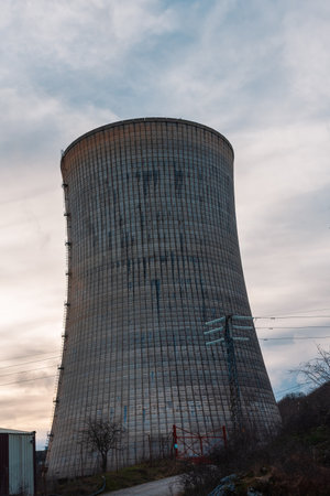 cooling tower of a thermoelectric plant in the process of dismantling near a town. Palencia, Spainの写真素材