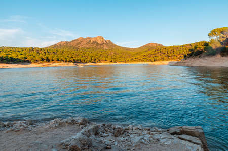 calm, peace and quiet in san juan reservoir in madrid during sunset in autumn. Madrid, Spainの写真素材