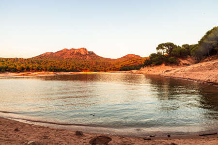 calm, peace and quiet in san juan reservoir in madrid during sunset in autumn. Madrid, Spainの写真素材