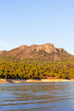 calm, peace and quiet in san juan reservoir in madrid during sunset in autumn. Madrid, Spainの写真素材