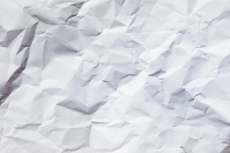 A crushed wadded up piece of white paper. For textures and backgroundsの写真素材