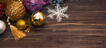 Rustic wooden table and decorations for christmas tree. Flat lay. Free space rot your textの写真素材