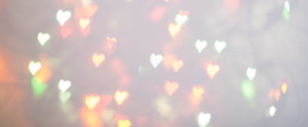 Abstract blurred background. Colorful shimmering Christmas lights bokeh of electric garlands. New Year bokeh background.の写真素材