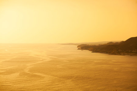 Sunset at Mediteranean sea, Kleopatra beach. Turkey night. Orange colors.