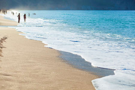 Blue sea water and yellow sand. Summer beach and holiday. Sea backgroundの写真素材