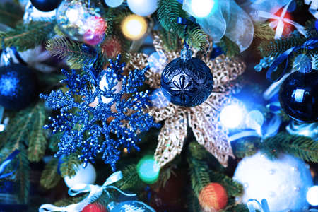 Close up of christmas ornaments on tree. Christmas concept background.の写真素材